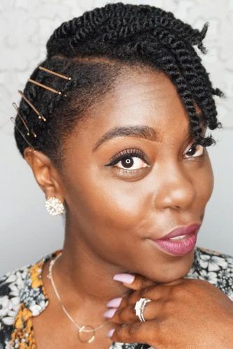 short Senegalese twist braids on top with the shaved sides, a very funky, chic look for the natural with personality!