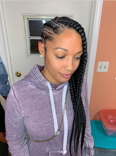 Cute Lemonade braids on pretty light-skinnned pretty black woman.