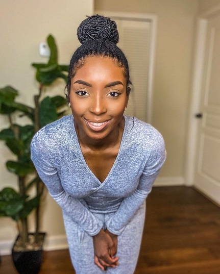 Neat and pretty sisterlocks on happy black woman. sisterlocs.