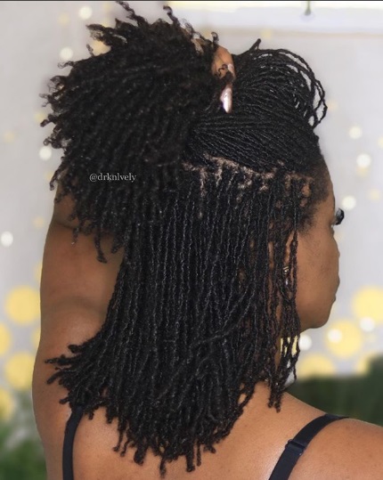 Cute long sisterlocks styles on pretty black woman. sisterlocs.