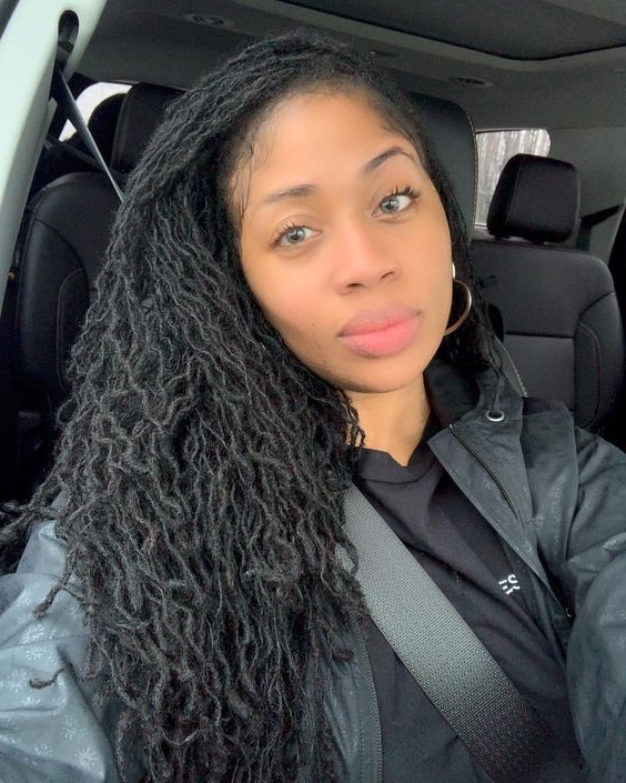 Cute sister locks style on pretty black young woman. sisterlocs.