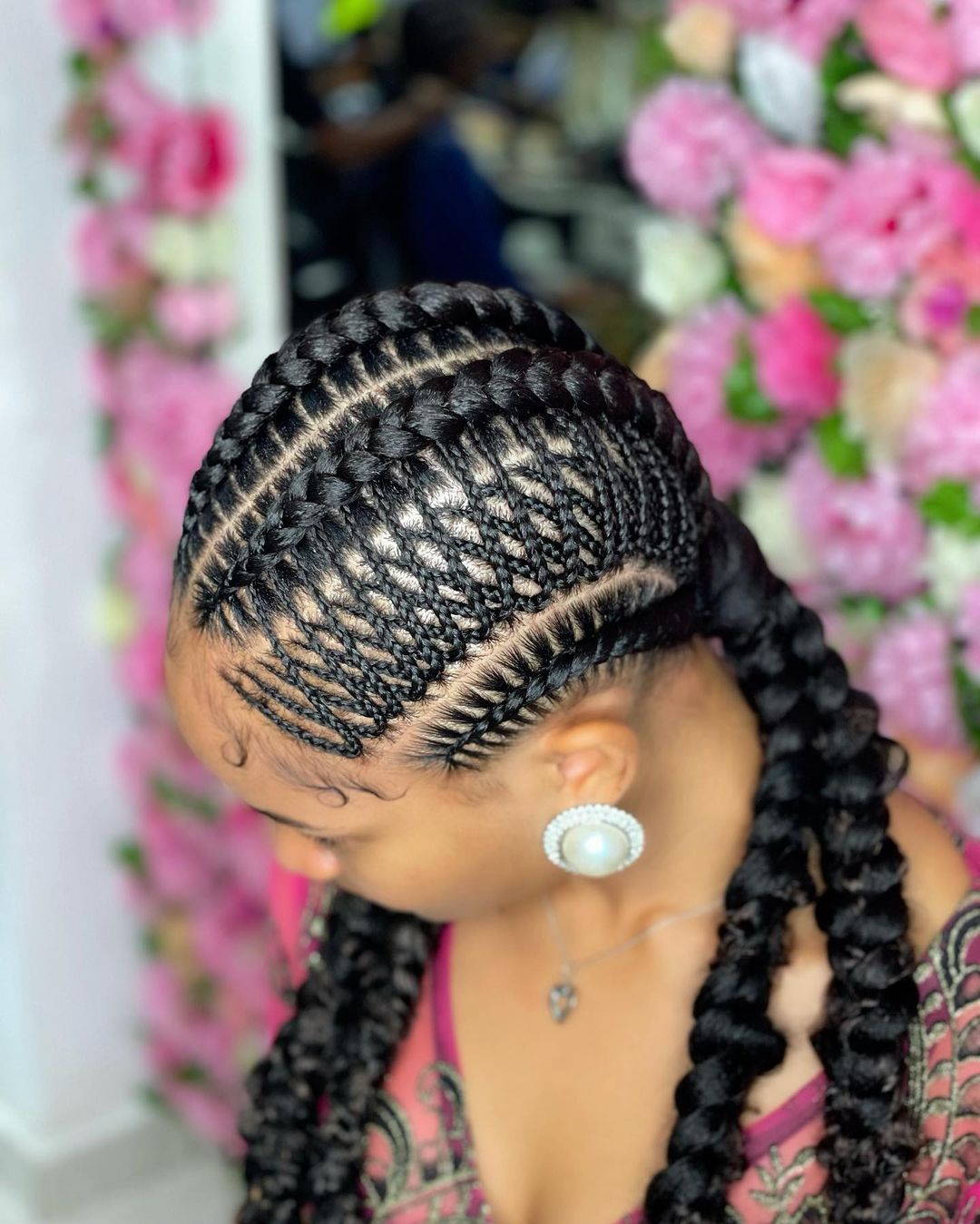 Brown-skinned African american girl. feed-In stitch braids, two feed in braids, small feed in braids ponytail, 6 feed in braids with box braids