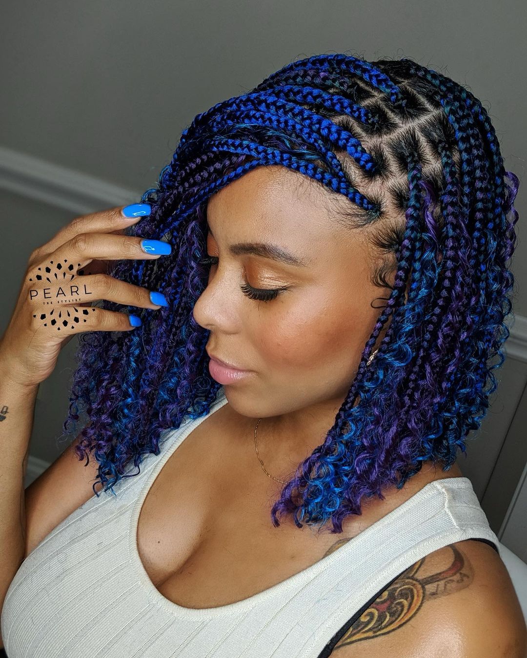 braided hairstyles with blue colored tint dye highlight accents NHP Approved