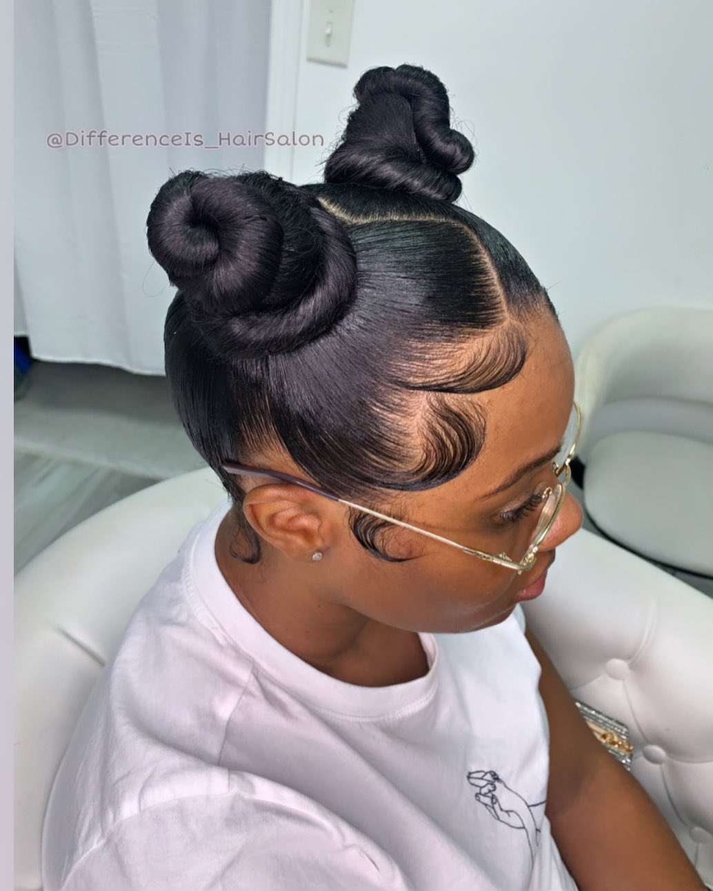 Black hairstyles double knotted ninja buns for women NHP Approved