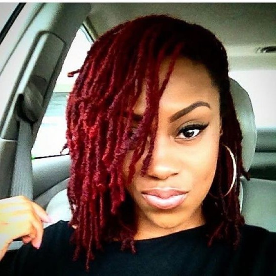 Red hair sisterlocks on pretty black woman. sisterlocs.  Nike, good hair.